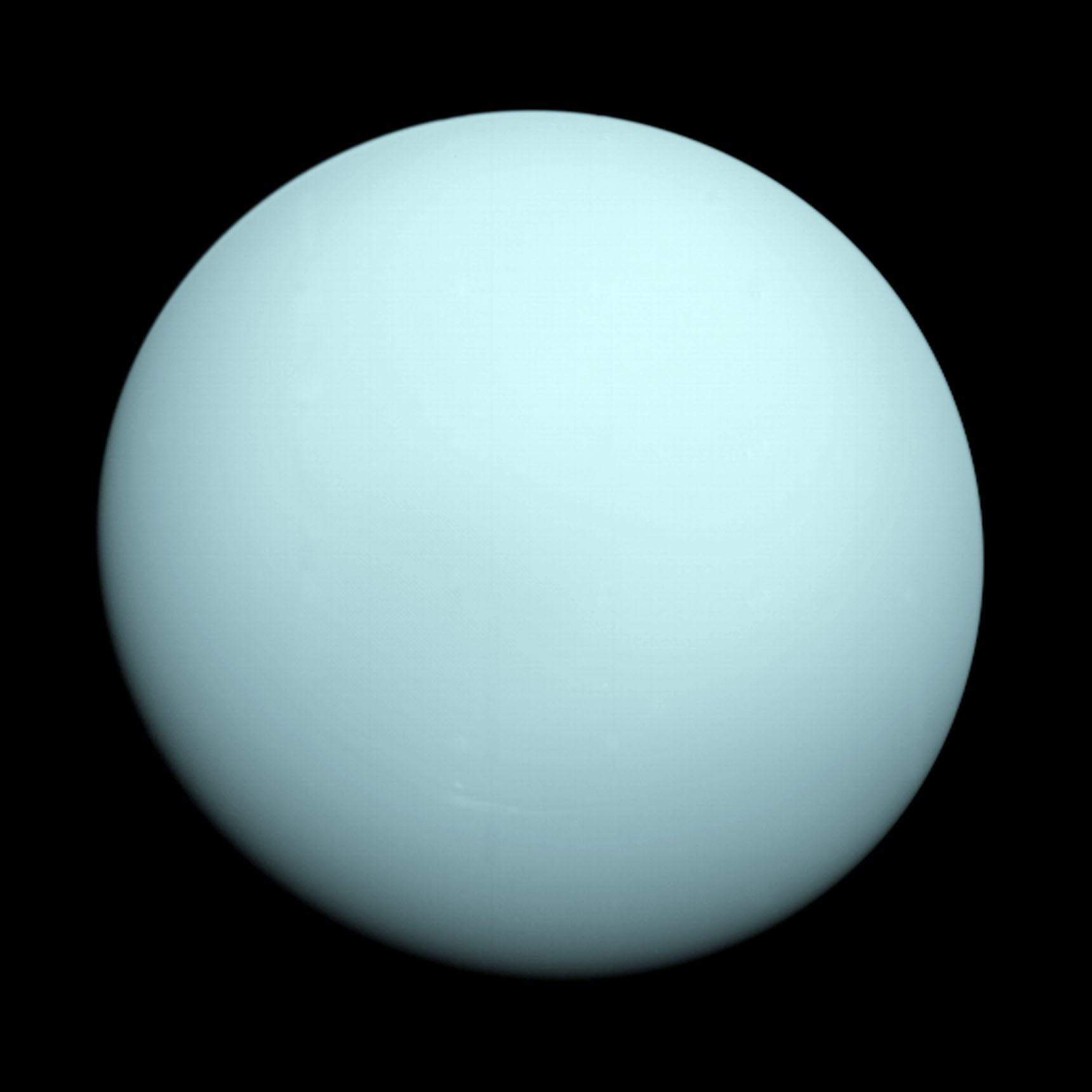 A sphere covered by featureless light blue clouds.
