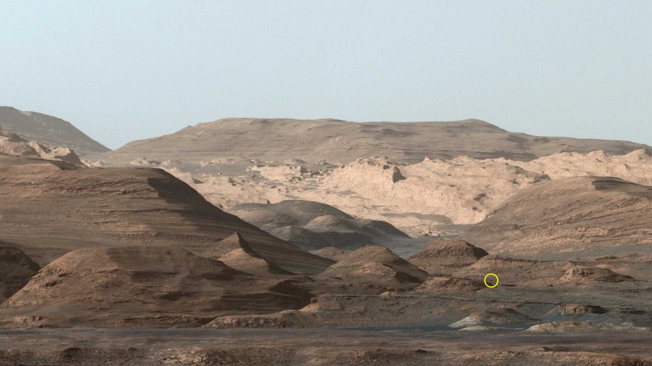 slide 3 - Martian landscape with rolling hills