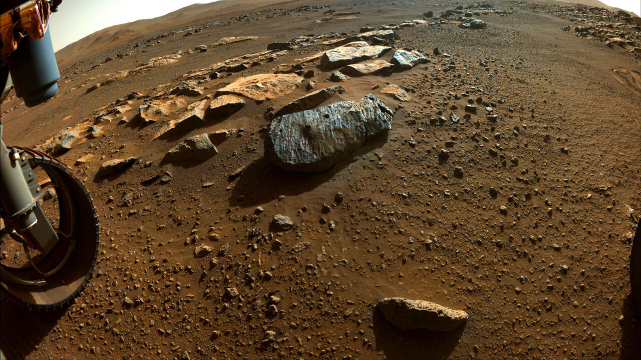 Two holes are visible in the rock, nicknamed “Rochette,” from which NASA’s Perseverance rover obtained its first core samples. 